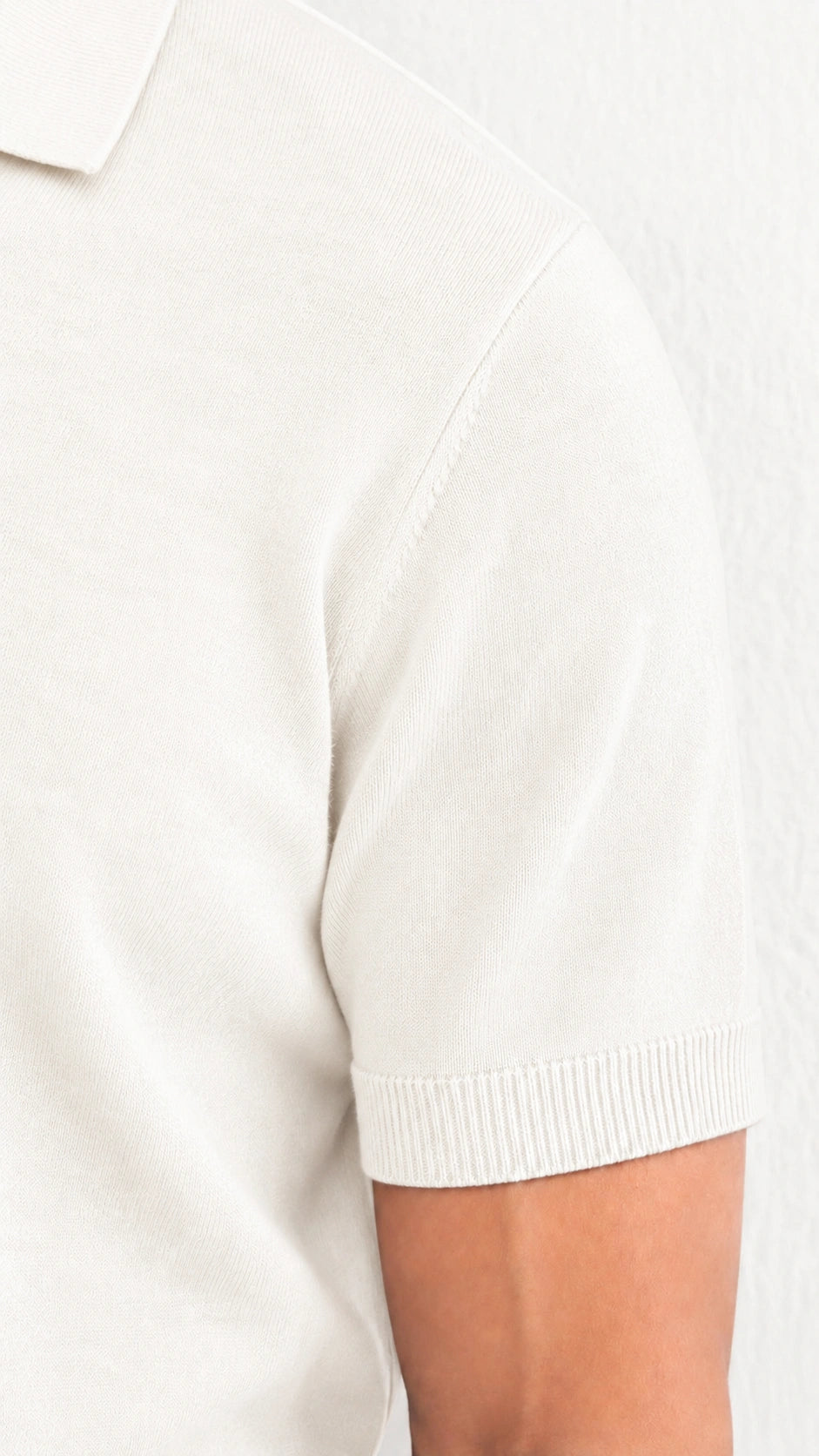 Polo in maglia merino avorio
